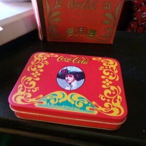 vintage cocoa cola tin with new cards, pencil & pad never used.